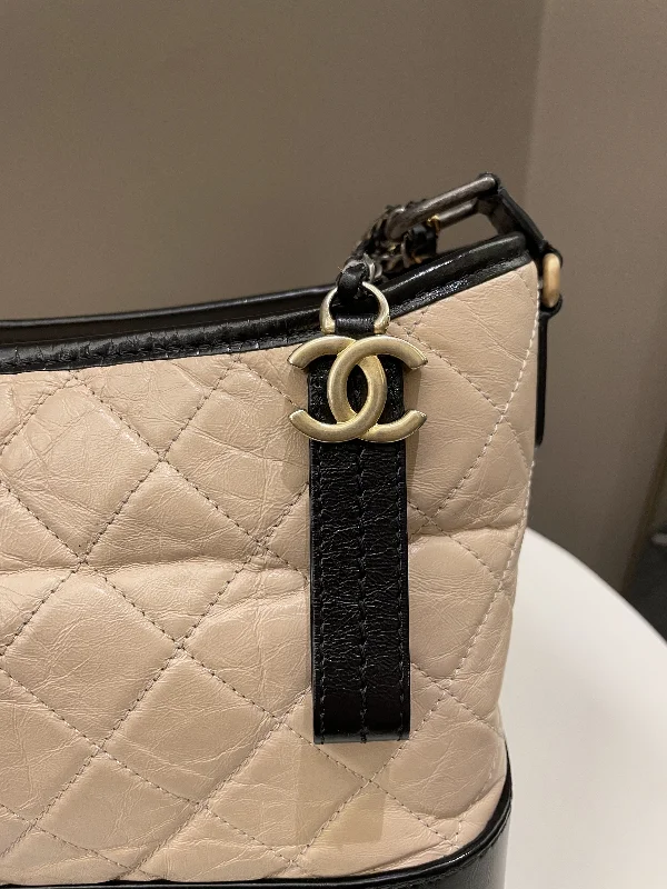 Chanel bags for women with a taste for high fashionChanel Quilted Gabrielle Hobo Beige / Black Aged Calfskin