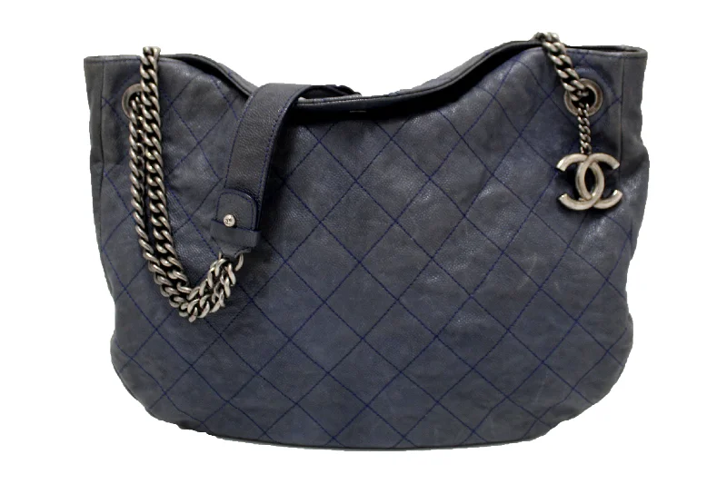 Chanel bags in luxury boutiques worldwideChanel Blue Quilted Caviar Leather Hobo Shoulder Bag