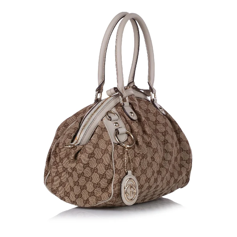 Gucci Marmont bags for women with quilted leather exteriorsGucci GG Canvas Sukey Satchel (29098)