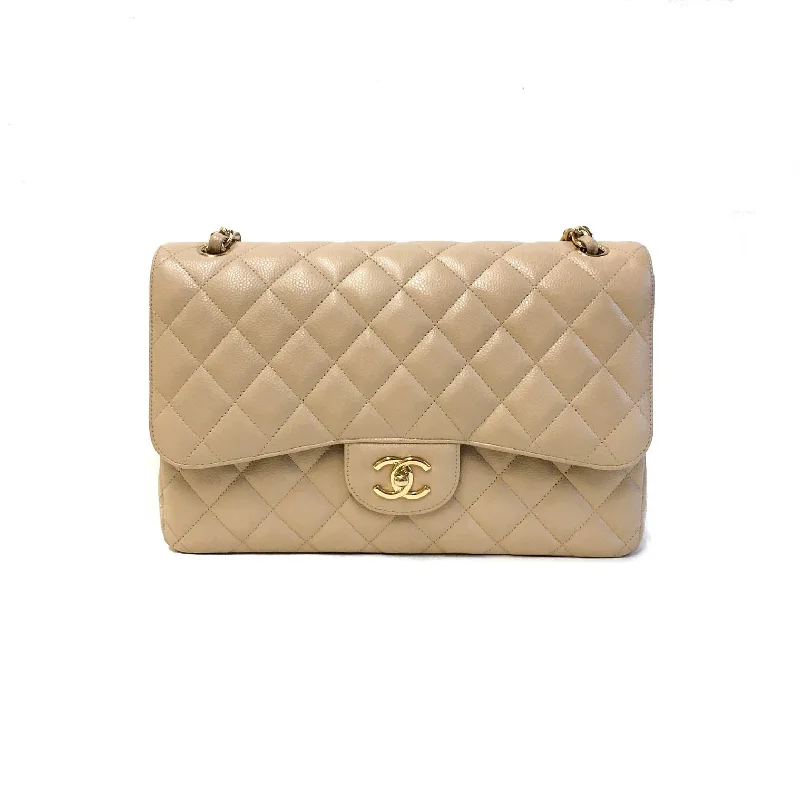 Chanel bags with gold, silver, and pearl accentsDouble Flap Jumbo in Beige Caviar Leather