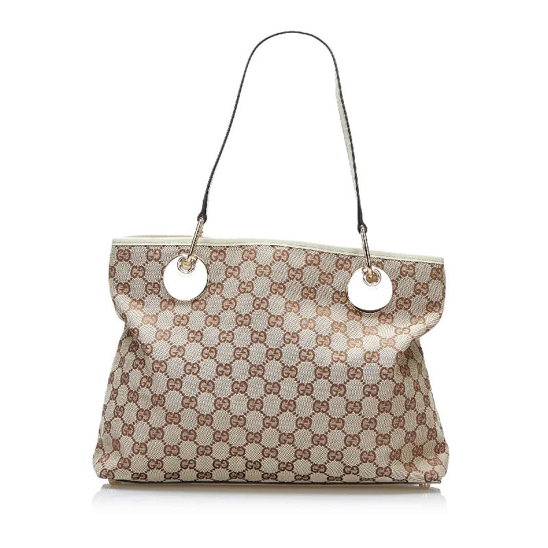 Gucci tote bags for women with a printed Gucci logoGucci GG Canvas Eclipse Tote Tote Bag