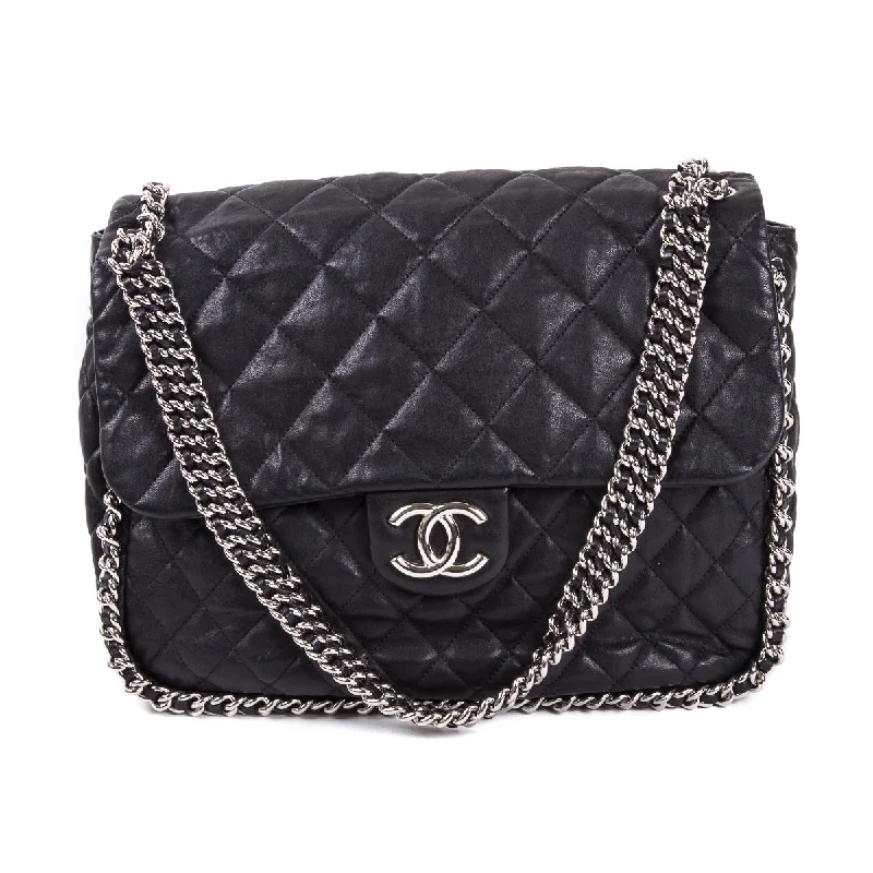 Chanel bags with intricate metal hardwareChain Around Jumbo Flap