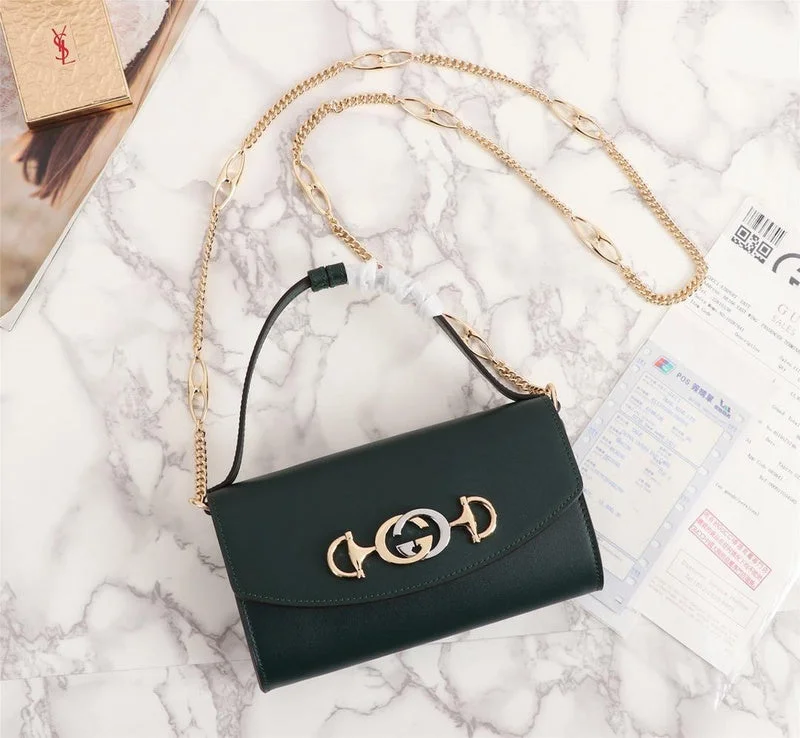 Women Gucci bags with a snap - button closure and a decorative charmBC - GUCCI BAG - 915