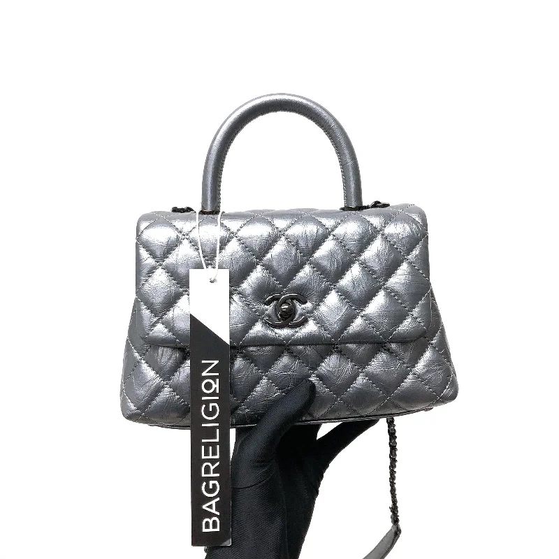 Chanel bags available in bold colors and patternsQuilted Mini Coco Handle Flap Silver