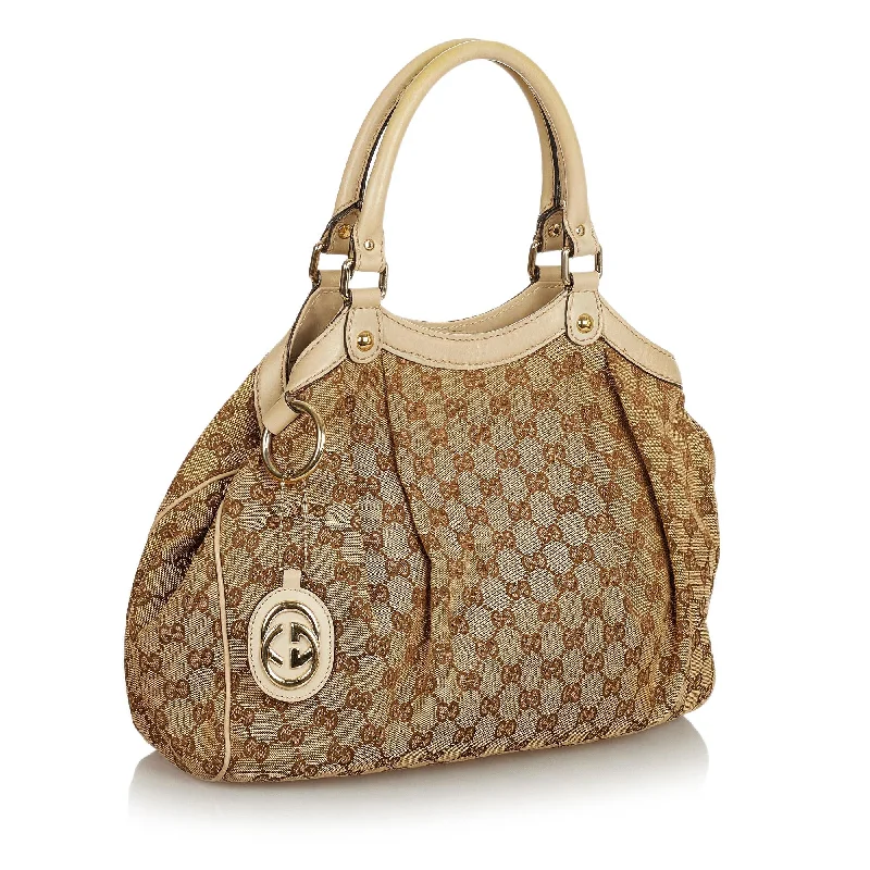 Women Gucci Sylvie bags with a detachable ribbon detailGucci GG Canvas Sukey Tote Bag (25719)