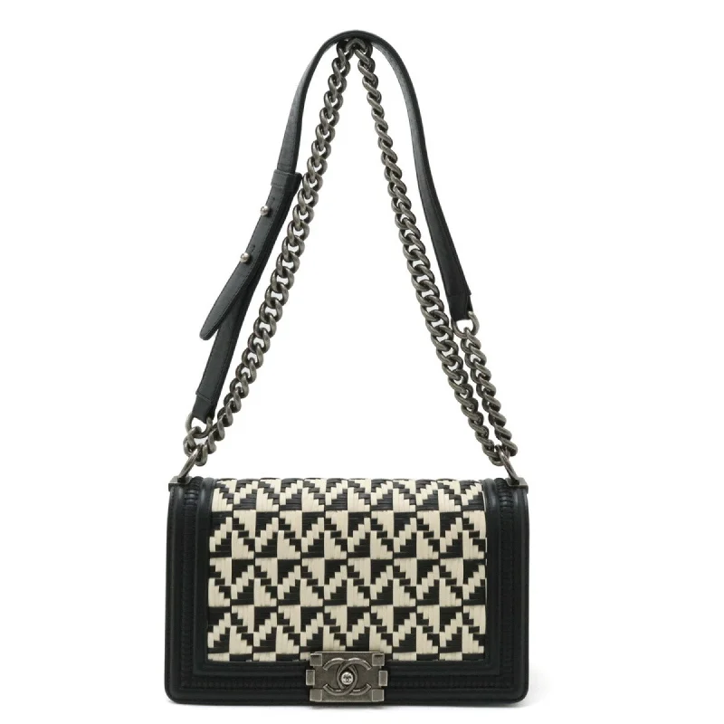 Chanel bags with gold, silver, and pearl accentsCHANEL Boy Chanel Coco Mark Chain Shoulder Bag Geometric Pattern Bicolor Leather Black White