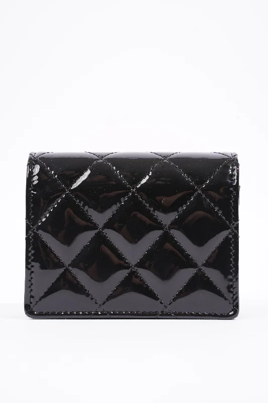 Chanel bags available at online luxury retaileChanel Wallet on Chain Black Patent Micro