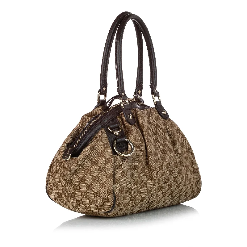 Ladies Gucci Dionysus bags in a pastel colorGucci GG Canvas Sukey Satchel (34504)