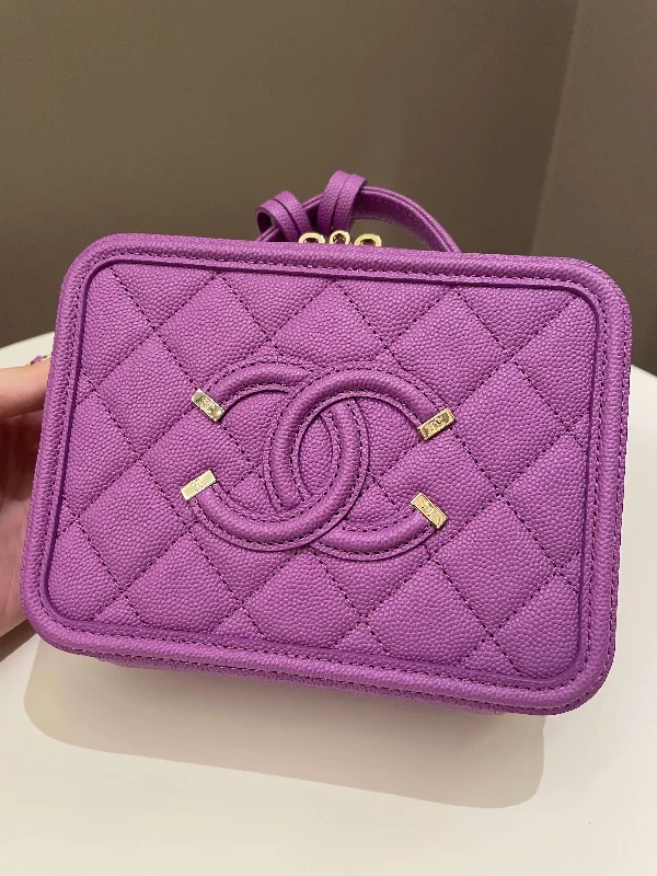 Chanel bags with iconic gold chainsChanel Filigree Vanity Case Purple Caviar