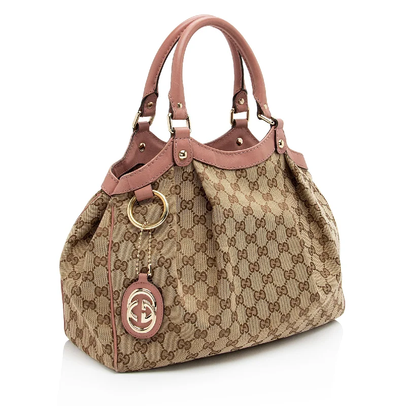 Women Gucci bags with a front - zip pocket for small itemsGucci GG Canvas Sukey Medium Tote (3dmy1R)